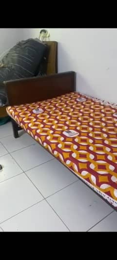 Single wooden bed for sale