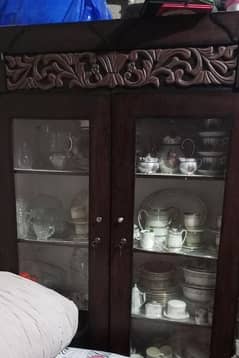 king size bed with side tables crockery cabinet