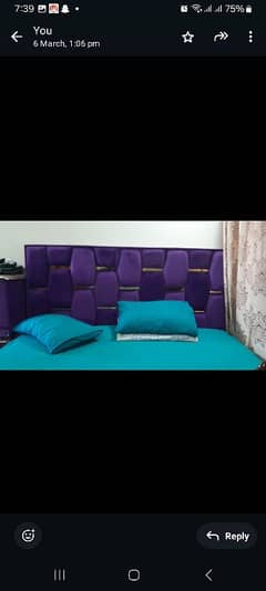 bed along with dressing nd side table