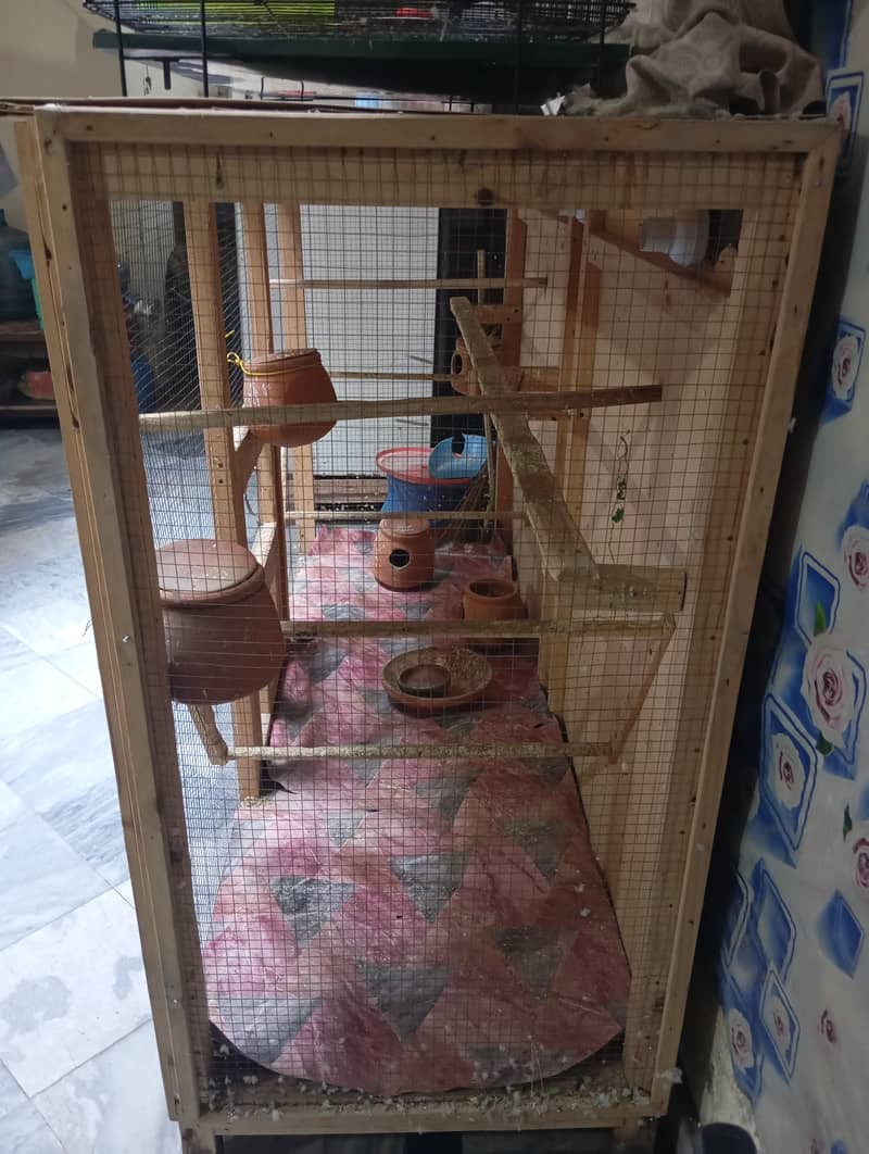Wooden cage for birds colony. 1