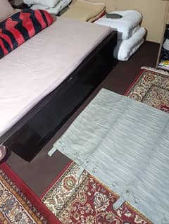 king sized bed in dark brown