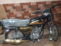 Honda 125 self start golden addition