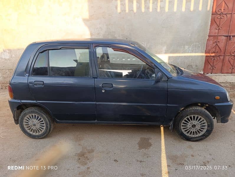 Daihatsu Cuore 2004 1