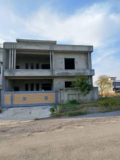 10 Marla Grey Structure Double Unit House Available. For Sale in Gulshan e Sehat E-18 Islamabad.