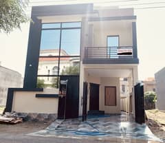 5 MARLA NEWLY BUILD BRAND NEW HOUSE IS FOR SALE IN DHA PHASE 11 RAHBAR SECTOR 2