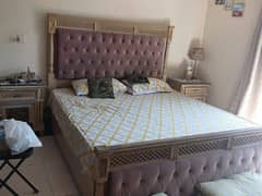 Good condition bed with dressing and sidetable is for sale