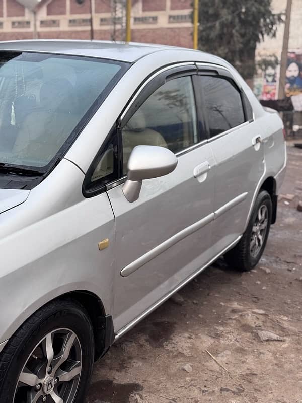 Honda City IDSI 2006 with Golden registration number 6