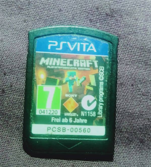 Ps vita with all accessories and 3 game. 12