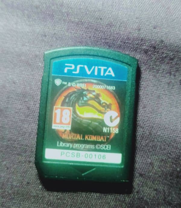 Ps vita with all accessories and 3 game. 13
