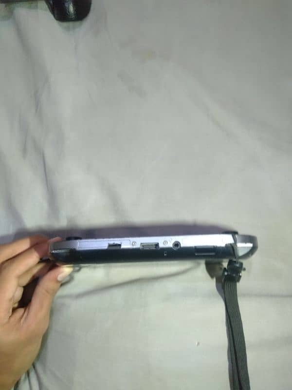 Ps vita with all accessories and 3 game. 17