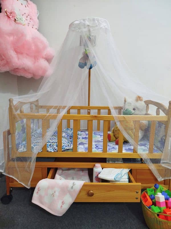 Wooden Baby Cot and Swing With Mosquito Net & Storage Cabinet 1