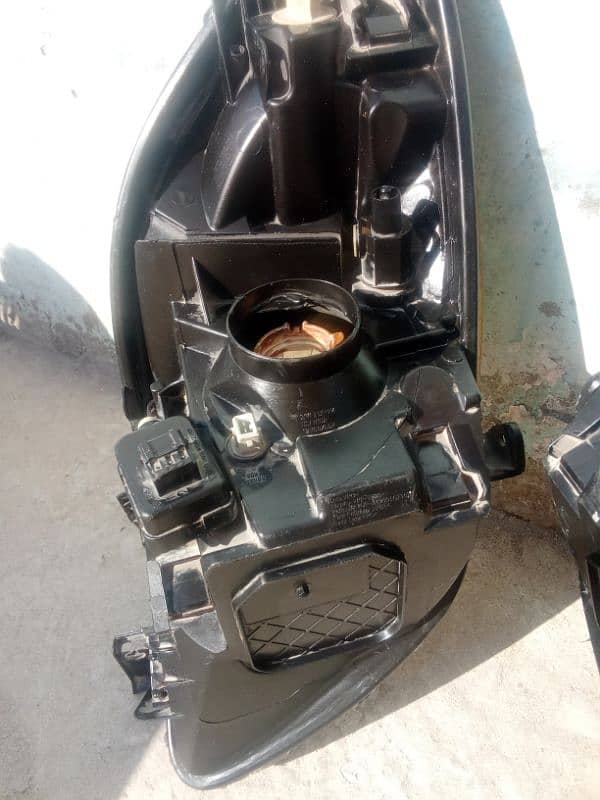 vitz 7 model genie front headlight japni 1
