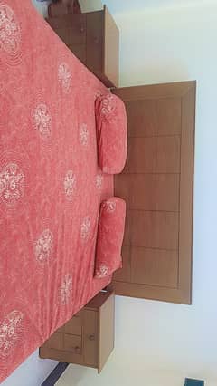 Double wooden bed with side tables