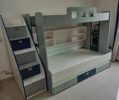 Triple bunk bed for sale. Perfect for kids, guests, or sleepovers