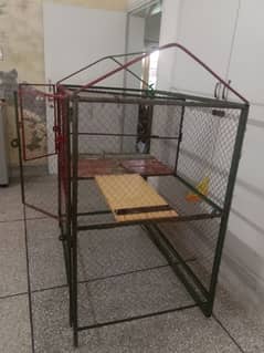 large iron hens cage