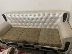 Sofa in good conditions in white color rexine