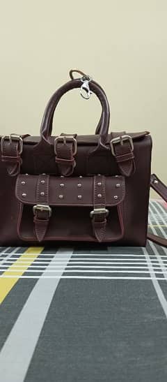 2 different hand bags/ purse / cross body