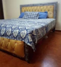 Queen Sized  quality wooden bed with frame and mirror.