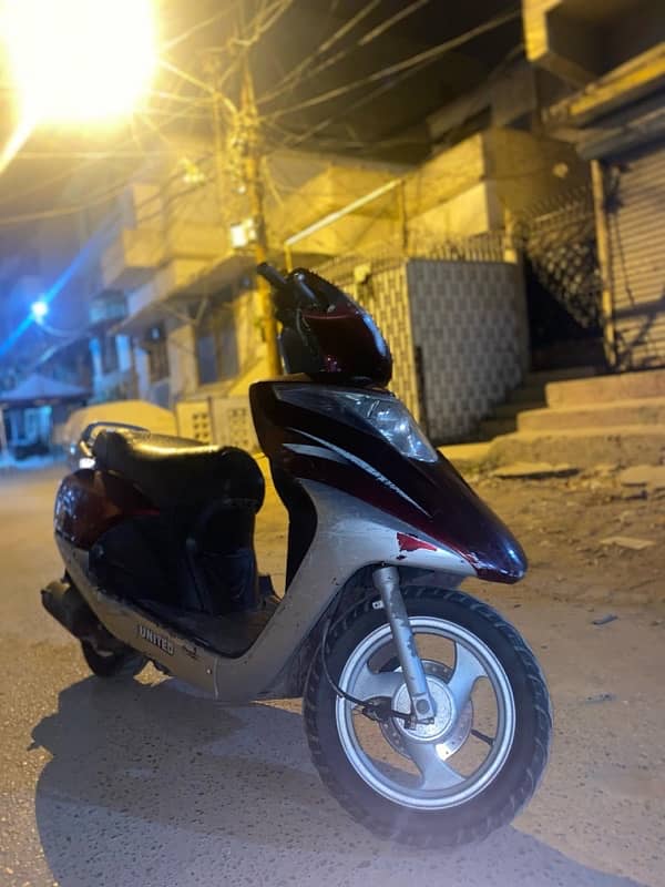 united scooty 100cc 1