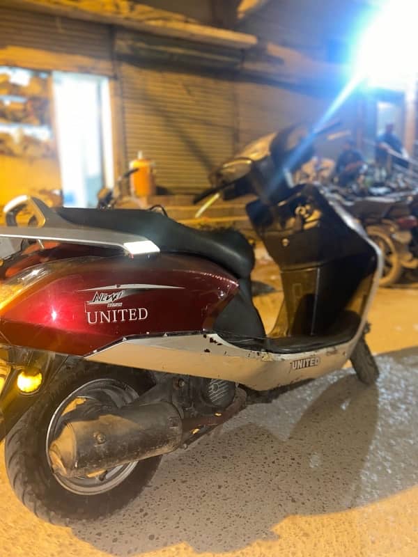 united scooty 100cc 2