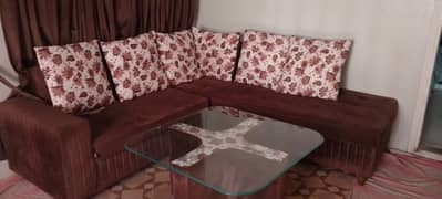 L Shaped  coution sofa set with center table with 4 puffys