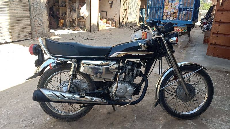 honda 125 selft start with gold number 6