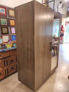 wooden cupboard with mirror