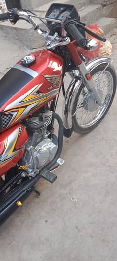 Honda 125 25 model number NH lga latter kata hai latter 25 ka paka