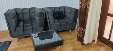 2 sofas with table