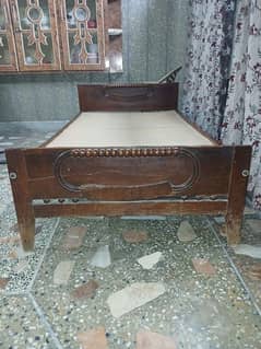 old strong wooden bed