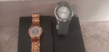 two watchs universe point made in UAE and one rado swiss joblie UAE