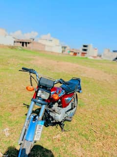 Honda 125  model 2021 Islamabad golden Numbers own my name urgent sale