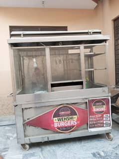 Stainless steel counter with all necessary items of the shop