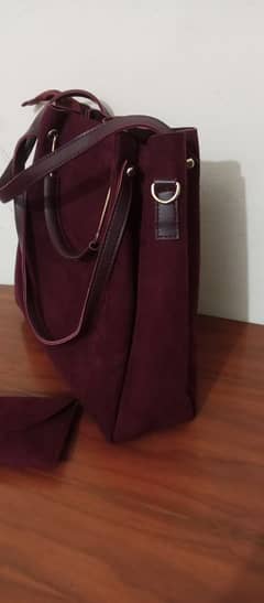 mehroon hand bag