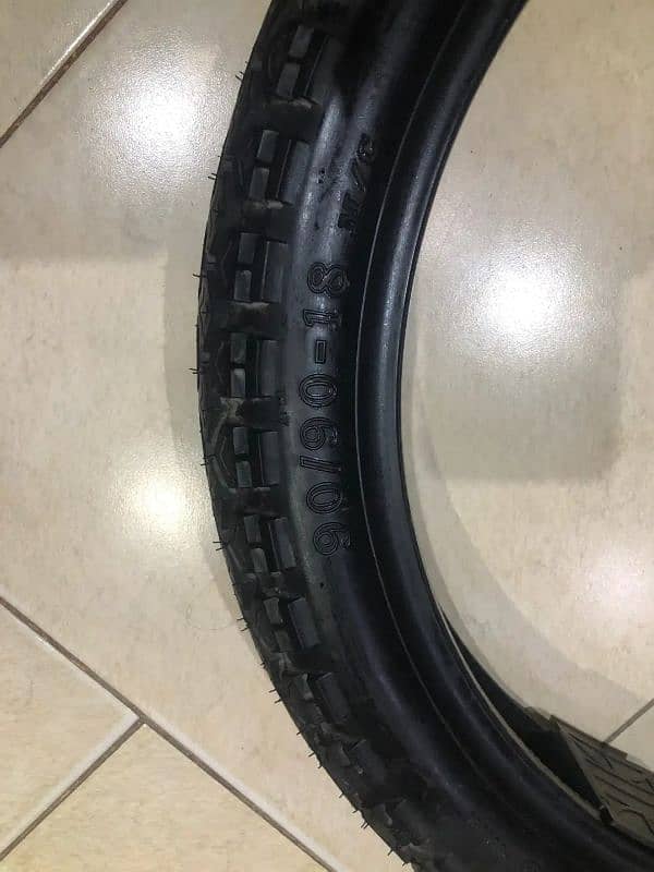 Honda 150f Genuine Cordial tyres with tubes 9