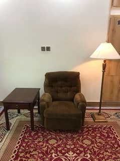 Imported recliner with table and lamp