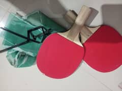 tabble tennis racket and net