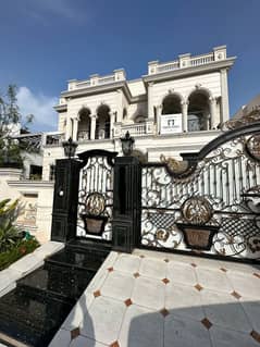 One Kanal Brand New Spanish Faisal Rasul Design Most Beautiful Bungalow 2 Servant Quarter In Basement For Sale At Prime Location Of DHA Lahore Near To Park Masjid &Amp;Amp; Commercial Market.