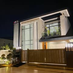 One Kanal Brand New Luxury Ultra-Modern Design Most Beautiful Fully Furnished Bungalow 2 Servant Quarter In Basement For Sale At Prime Location Of DHA Lahore Near To Park Masjid & Commercial Market.