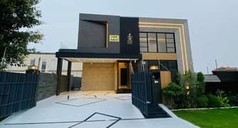 One Kanal Brand New Luxury Ultra-Modern Design Most Beautiful Full Basement Home Theater Bungalow For Sale At Prime Location Of DHA Lahore Near To DHA Raya Fairways Commercial.