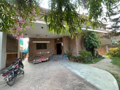 One Kanal Used Modern Design Bungalow For Sale At Prime Location Of DHA Lahore Near To Park & Commercial Market