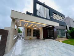 One Kanal Brand New Luxury Ultra-Modern Design Most Beautiful Bungalow 2 Servant Quarter In Basement For Sale At Prime Location Of DHA Lahore Near To Park & Commercial Market.