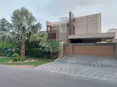 One Kanal Lash Green Lawn + One Kanal Slightly Used Luxury Ultra-Modern Design Most Beautiful Bungalow For Sale At Prime Location Of DHA Lahore Near To DHA Lahore Near to Penta Square & Jalal Sons.