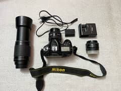 Dslr Nikon D7100 with 3 lenses (35-70mm,50mm 1.8d, AF 70-300mm) Read.