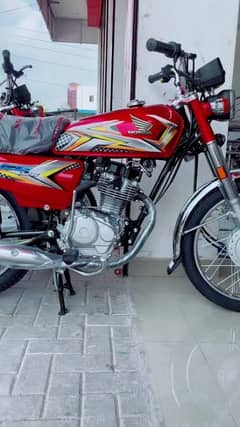 Honda 125 red Applied for sale.