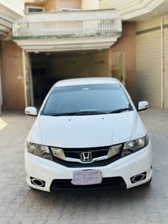 Honda City IVTEC 1.3 manual B to B 2019 white color islamabad number