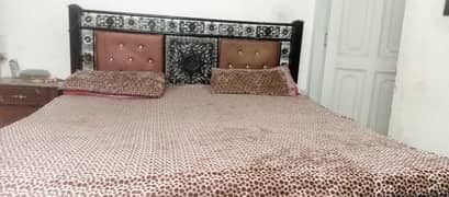 iron double bed for sale in good condition without matress