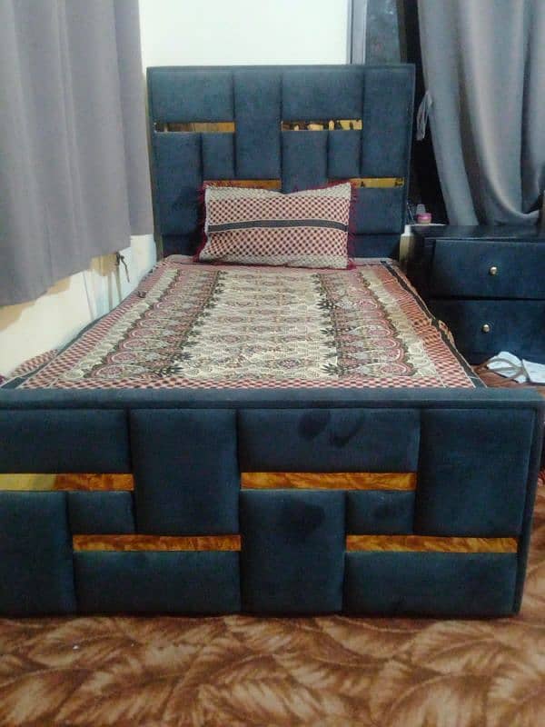 Single bed with side table 0