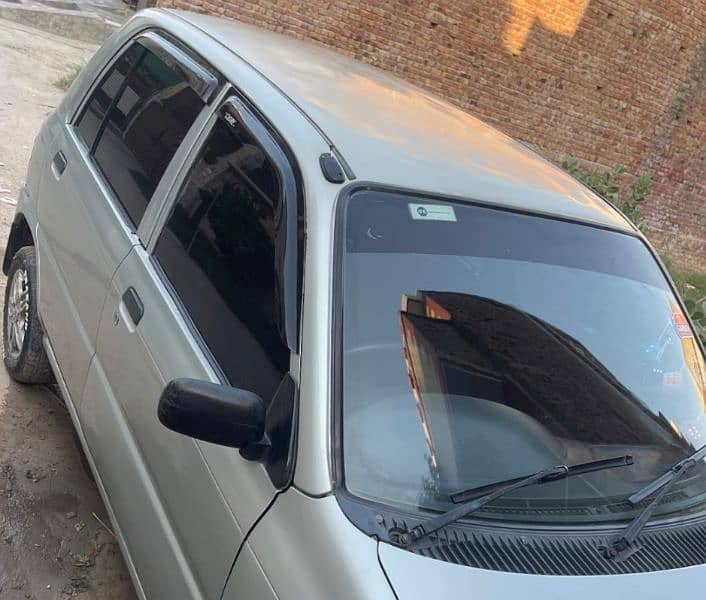 Daihatsu Cuore 2006 first owner Lahore number 0