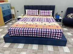 Low profile bed with side tables and mattress